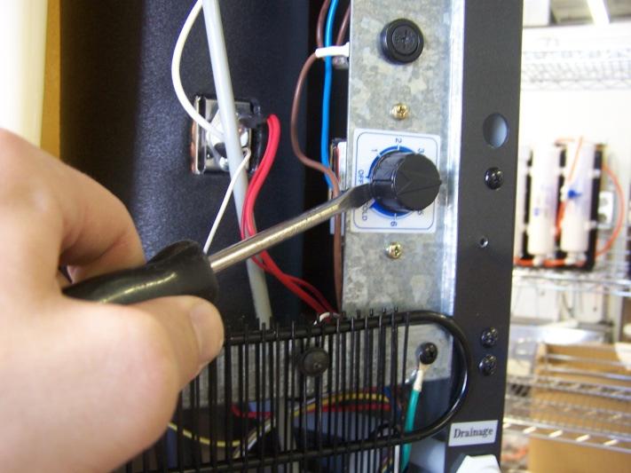 The sensor probe (integral with the switch ) is inserted into the receptacle at the top of the cold