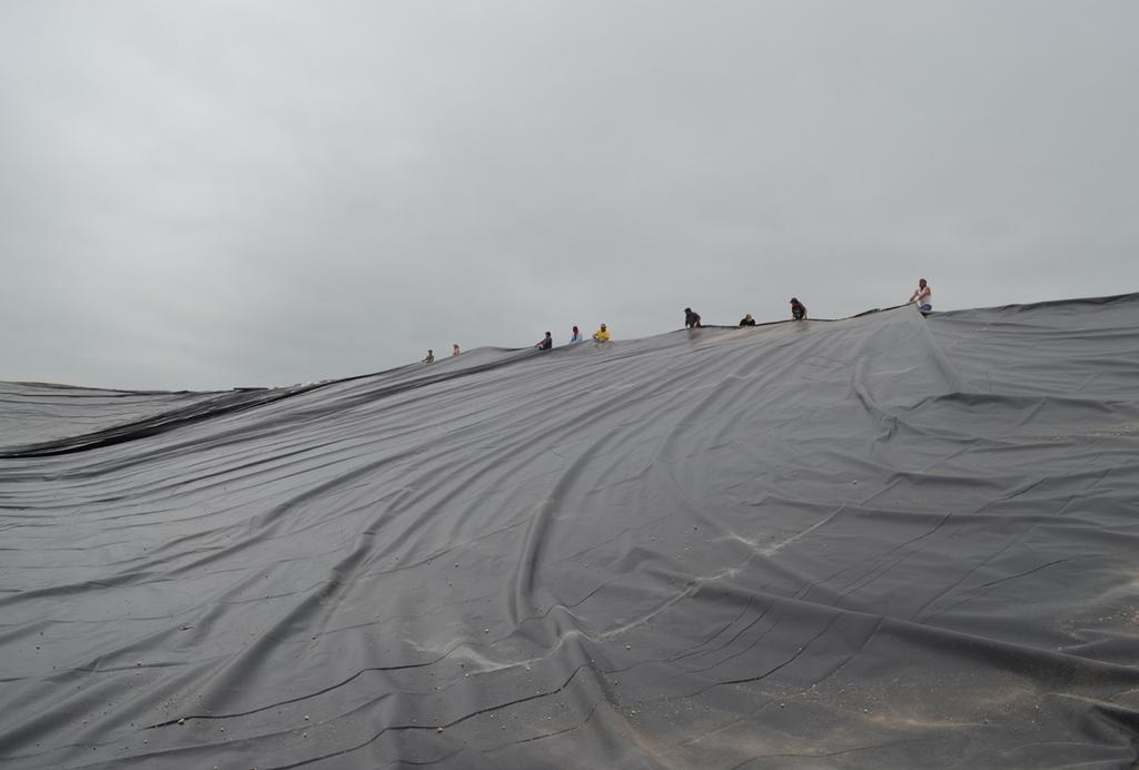(approximately 3 to 6 inches (7.5 to 15 cm) over the geomembrane will greatly reduce the chance of damage. For more information on this subject, please contact your IPG technical representative. 6.1.5. All pipes, drains, fittings, etc.