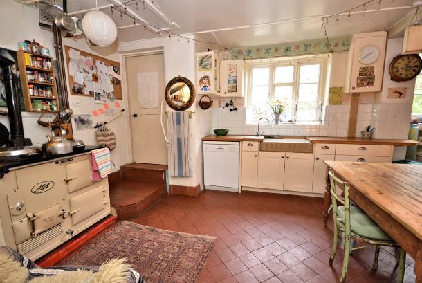 ACCOMMODATION COMPRISES:- A stable entrance door opening into ENTRANCE HALL Arched recess with built in bench seat, original quarry tiled floor, double radiator and doors opening to the following