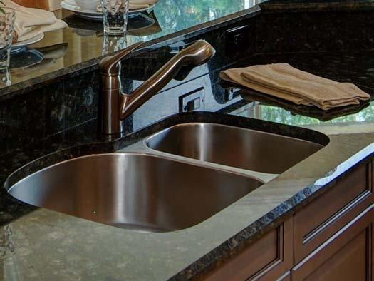 GHO Homes Corporation SINKS AND FIXTURES Your home may have one or more types of sinks installed throughout the kitchen and bath areas.