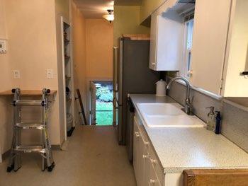 1. Kitchen Room Kitchen Walls and ceilings appear in good condition overall. Flooring is vinyl. Accessible outlets operate. Light fixture operates.