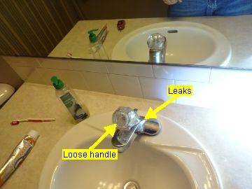 Bathrooms 1. Sink Main level hall bathroom sink had a loose faucet handle and the faucet leaked.