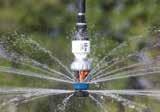 By dividing the nozzle flow into a larger number of streams and