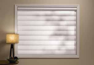 Translucent fabric vanes filter ambient sunlight, even when the vanes are closed, to provide a warm glow in any room.