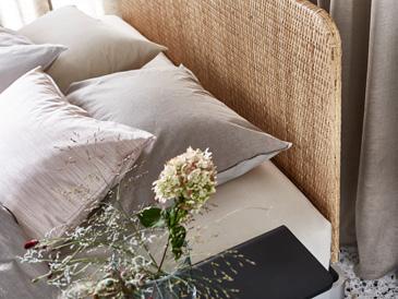 PH157203 PH157205 Or, go for something warm and earthy with the rattan headboard. Its natural fibers balance out the otherwise streamlined design of DELAKTIG, thus giving it a softer expression.