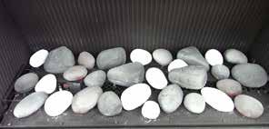 Place smaller grey and hite stones in the middle Place remaining smaller grey (g) and hite () stones