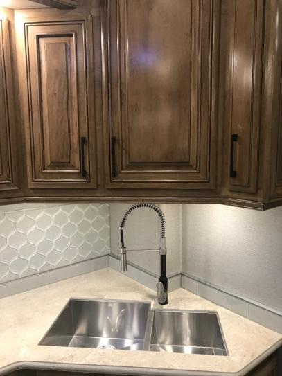 angles - New kitchen faucet with pull-down sprayer - New lavatory faucet