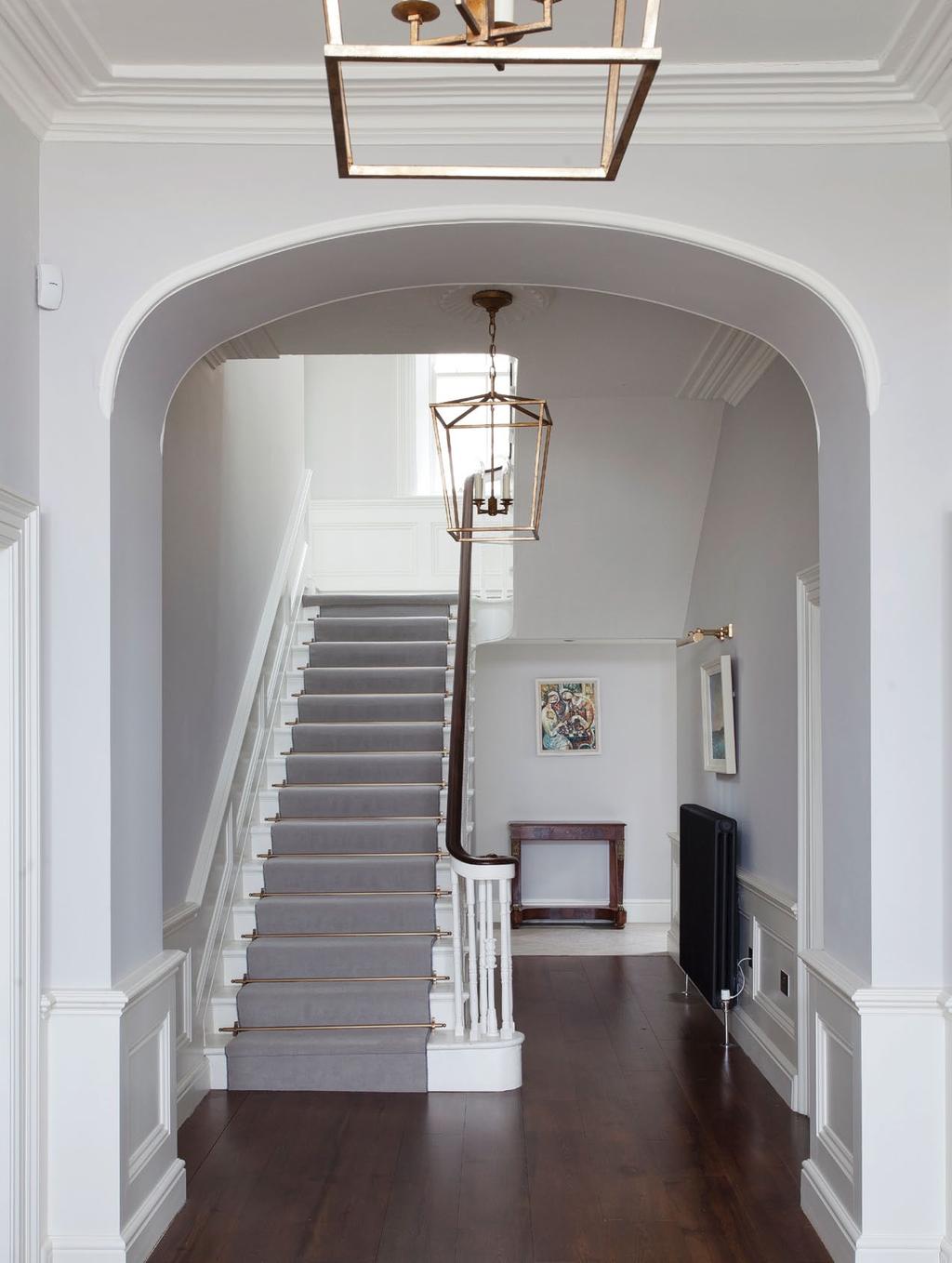 The grand entrance hall features original period