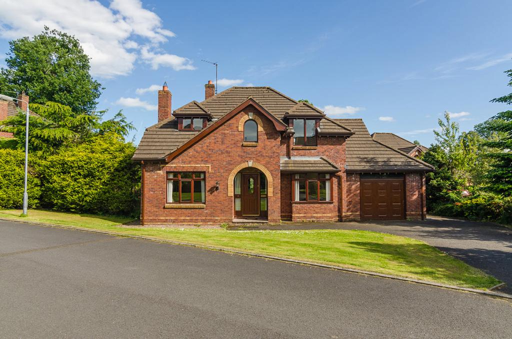 An attractive detached property situated on a mature site in this sought after neighbourhood just off the Lambeg Road.