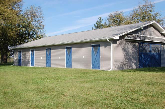 10 Stall Wood Barn with vinyl siding, 13 x 13 stalls with