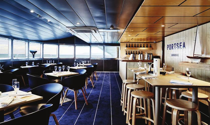 above top Navy coloured chairs from Hay add a touch of luxury to the Portsea Lounge.