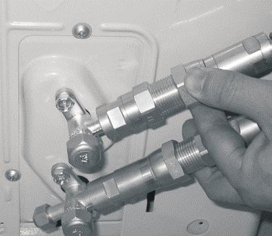 Align the refrigerant pipes correctly so that they line up with the valves and are not stressed.