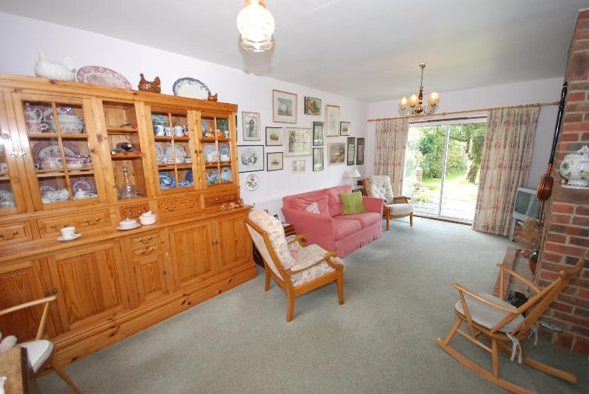 Double bedroom with wonderful view onto the garden and paddock beyond, built in wardrobes. Large welcoming space leading from the driveway, which leads to the utility room, cloakroom and sitting room.