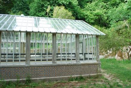 A greenhouse is a building in which plants are grown.