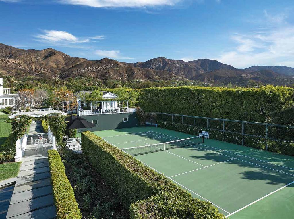 CHAMPIONSHIP TENNIS Surrounded by privacy hedges, the