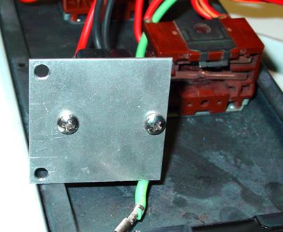 0817099) 1) Remove R/H service panel (refer 6.2.2). 2) Remove two screws holding buzzer bracket to panel. Two Screws Figure 6.3.19b 4) Remove old buzzer from bracket, and secure new buzzer to bracket.