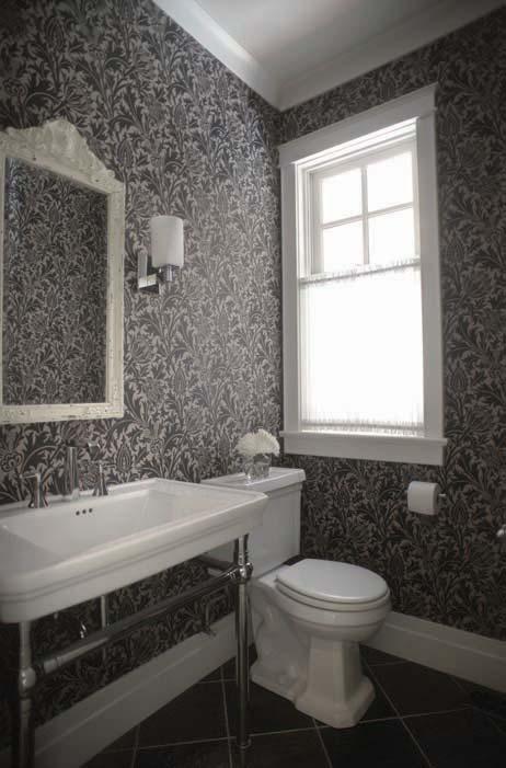 feature TOP LEFT: A classic black and white motif wallpaper adds a touch of sophistication to the powder room. TOP RIGHT: The layout of the main floor is ideal for entertaining.