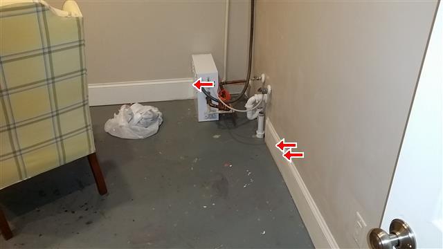 (3) Evidence of previous stains noted on the baseboard and floor in the