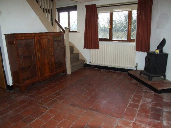 The Property Comprises Entrance Porch with lantern lights and post box. Pitched tiled roof.
