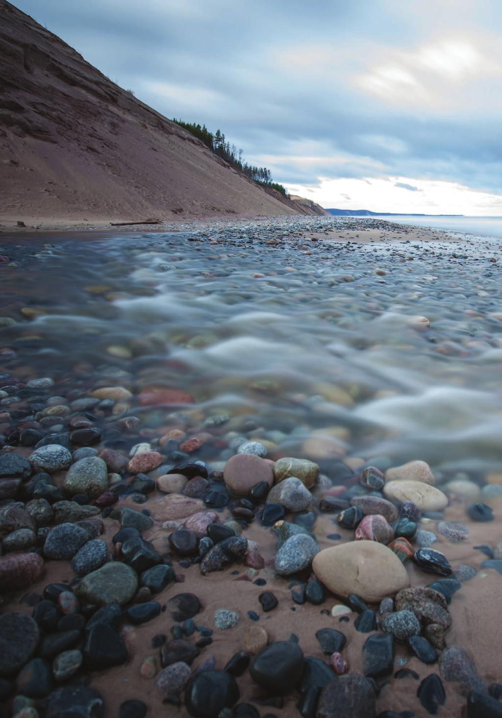 A DAY AT THE BEACH By: Sherrie Fox Spend even one hour in Northern Michigan walking its western shores, and you ll feel the inspiration for Beach Stones seating and tables. Natural. Fun. Refreshing.