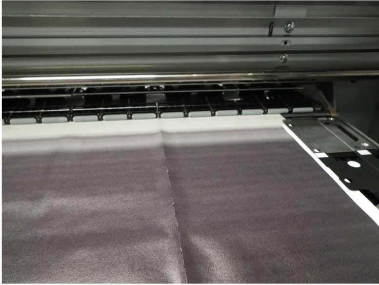 Checking for Clogged Print Head Nozzles Media Is Creased If media loaded in your printer is creased, try these solutions: Check that the Feeding Tension and Feed Speed