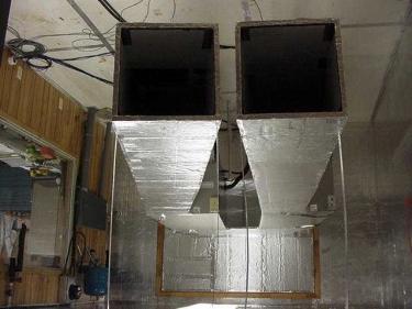 Figure 5. Side by Side Installation of Air Handlers within Appliance Laboratory. Figure 5 shows the ducting constructed for this test that is located within the indoor environmental control chambers.