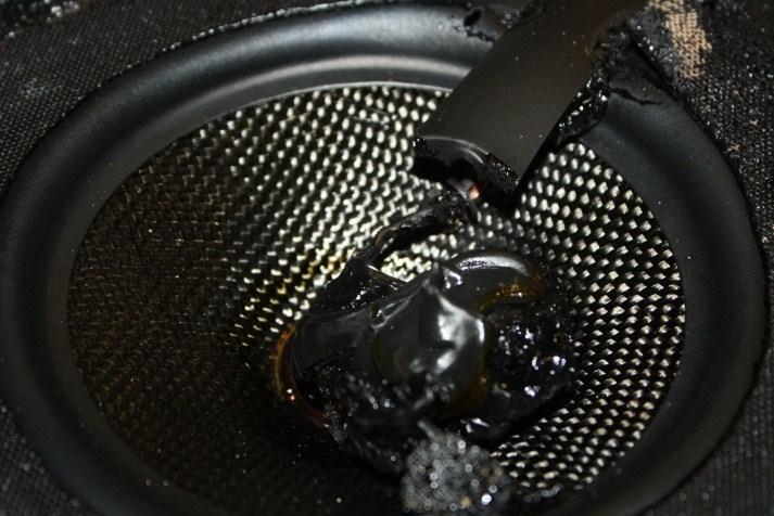 No visible combustion was observed from the speaker assembly, only melting of small amounts of plastic in the speaker interior.