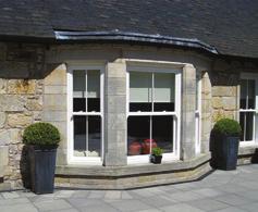 variable angle aluminium posts for strength combined with decorative PVCu trims to provide an aesthetically