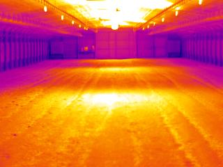 poultry house relatively quickly. The thermal images in Figure 25 were taken in side by side broiler houses. The initial floor temperature in both houses was approximately 60 o F.