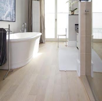 The owners of the flats were given a lot of room for individual design preferences. For example, one client also wanted a parquet floor laid in her bathroom.