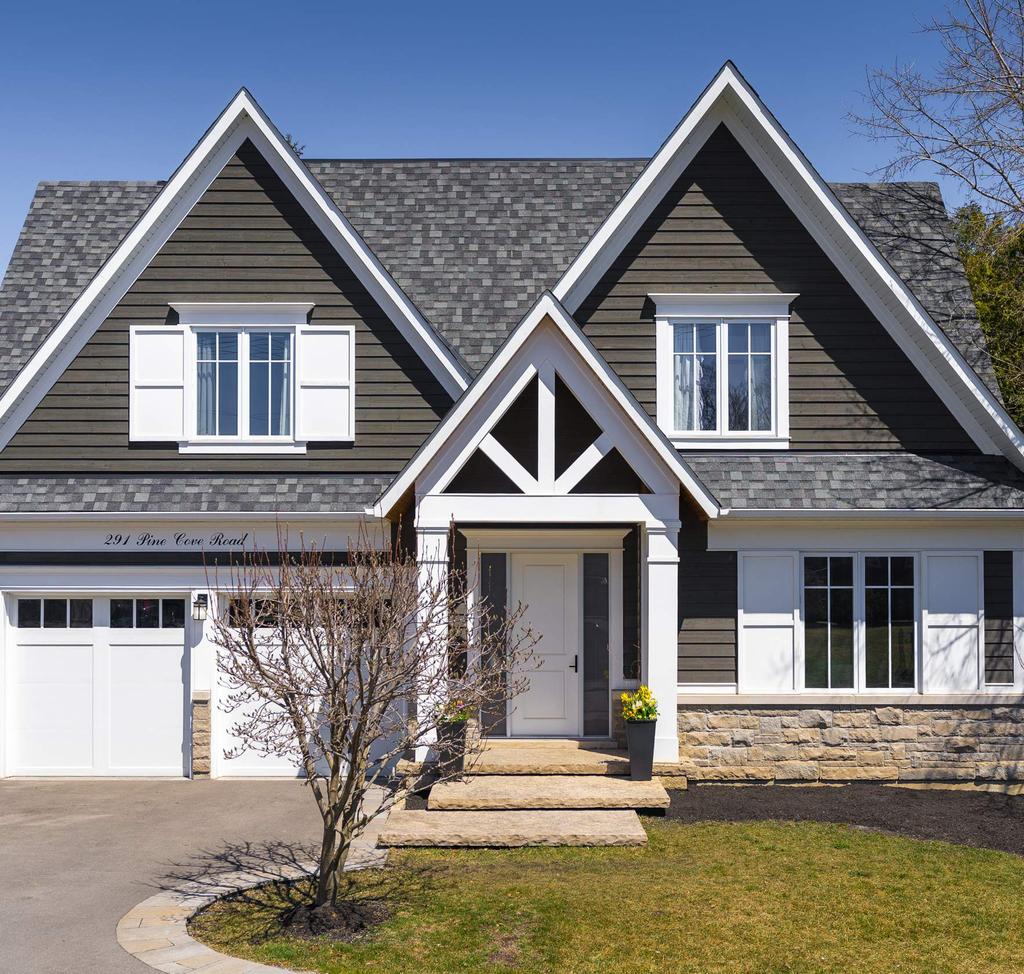 291 PINE COVE ROAD, BURLINGTON When one thinks of curb appeal, this Craftsmanstyle home designed by locally-recognized Architect David Small and built by Profile Construction in 2016, has a true