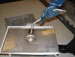This pan could be hot! Use protective cloth or glove, or severe burns could result.