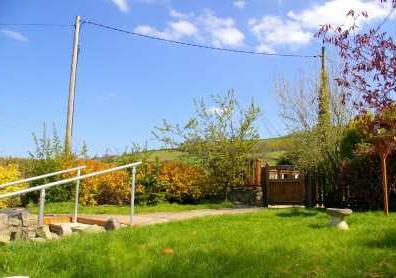 natural privet boundaries, access via remote timber gate from the lane. LARGE DETACHED GARAGE 7.