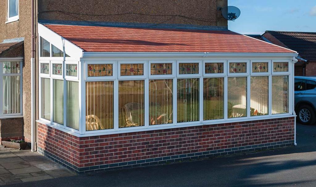 A classic Lean-to conservatory with glazed gable ends.
