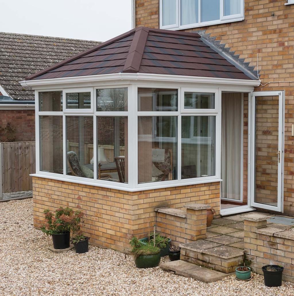 A solid roof looks immediately at home on an existing conservatory.