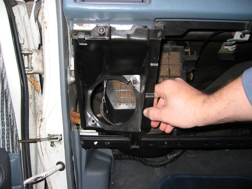 Next close the glove box and unscrew both the screws holding it in(underneath