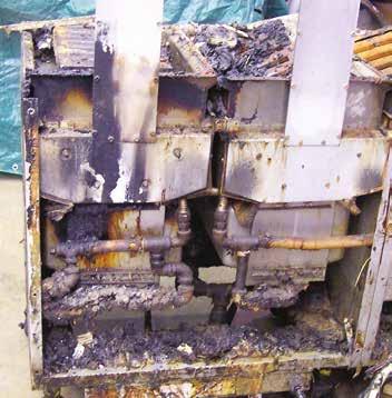 Partial damage of bowling center snack bar. A fire ignited in the cooking area of a bowling center snack bar, reportedly from a deep fat fryer, and it spread upward into a long vertical duct.