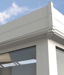 The UltraSky orangery system features a full glass roof, with a cornice externally and the plastered pelmet system