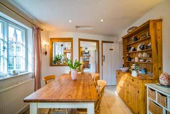 PROPERTY DESCRIPTION Fern Cottage is situated tucked off the High Street, approached over a private gravelled driveway and enjoys a very secluded, quiet and protected location, set in generous