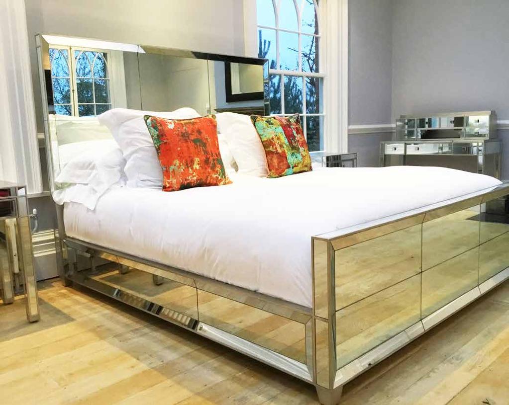 LAMOUR A fabulously glamorous bed, with panels of glass edged in