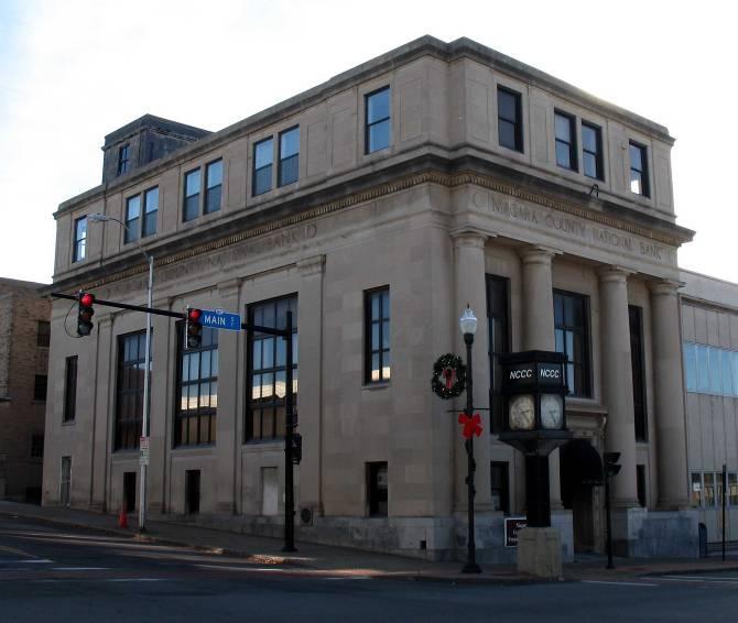 21 50 Main Street The former Niagara County National Bank Building is an example of a Temple-front Neoclassical commercial building.