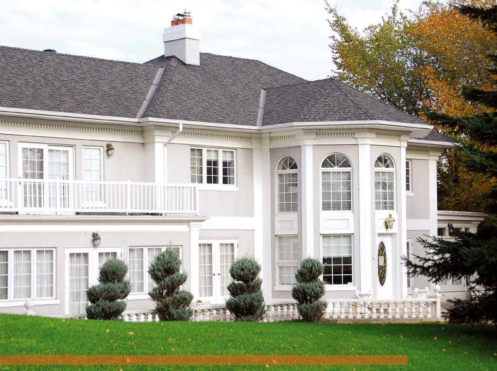 Soft White Timeless Elite double-hung and casement windows with