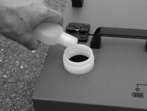 OPERATIONS STEP 4: Add the Gum Removal Solution Empty the concentrated gum removal solution into the fluid reservoir. Fill the remainder of the fluid reservoir with clean cold water.
