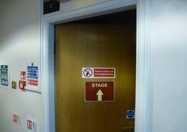Views of the fire doors to the loft, control room and the stage door stairs on the second floor, which do not have smoke