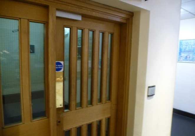 Views of the fire doors on the ground floor without smoke seals fitted to