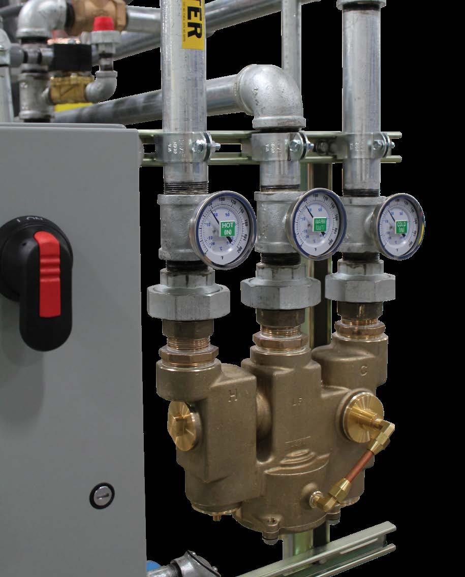 HF AXION thermostatic mixing valve that mixes hot and cold water to supply tempered water to emergency shower and eyewash fixtures requiring flow up to 78 GPM (295 LPM).