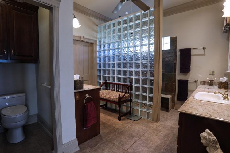 vanities and a large walk-in shower.