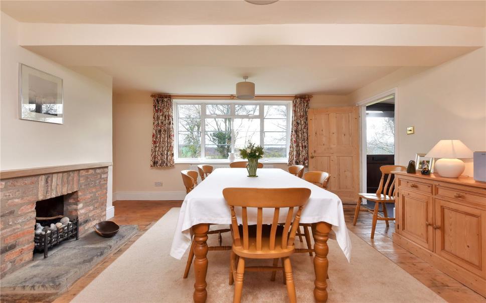 Accommodation The property is entered under a canopy porch through a double glazed front door into: Entrance Hall With beamed ceiling, radiator, stairs off to first floor landing, telephone point and