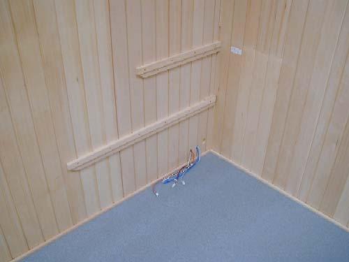 Step 1: Install the upper bench support on the right side of the back wall, according to the premarked line and predrilled holes, using the