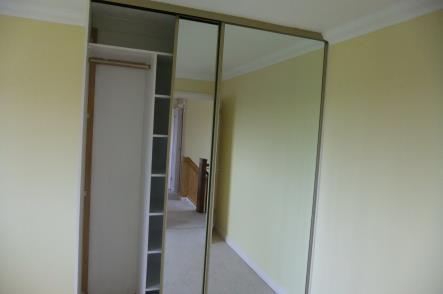 mirror sliding doors, hanging rail and shelves Wardrobes (Pic 5)